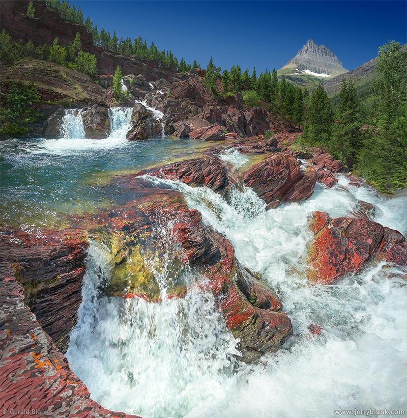 #68679 - Redrock Falls on Swiftcurrent Creek, Glacier National Park, Montana. Mount Wilbur is visible in the background - photo by Jerry Blank